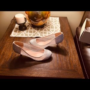 2 1/2 in silver iridescent glass bead heels.